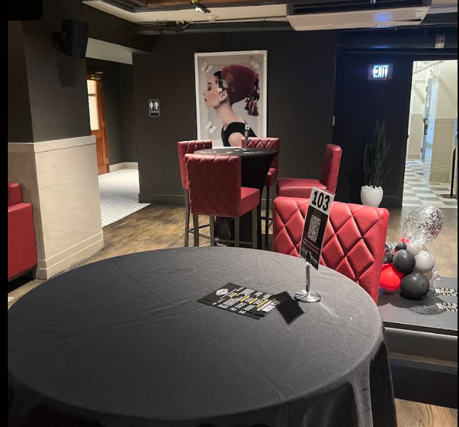 Library Cocktail Lounge seating with a QR ordering for bars code on the table